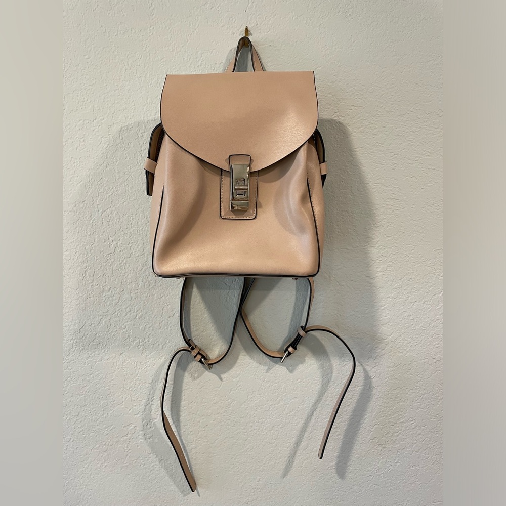 Neutral beige backpack with many pockets
